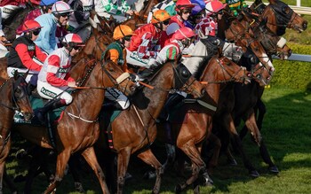 Runners line up at the start for The Randox Grand National Handicap Chase on Grand National Day during day three of the Grand National Festival at Aintree Racecourse on April 15, 2023