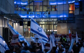 People gather outside BBC Headquarters to protest the corporations refusal to label Hamas 'terrorists'; October 16 2023