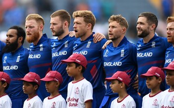 Adil Rashid, Ben Stokes, Gus Atkinson, Dave Willey, Joe Root, Chris Woakes and Jonny Bairstow sing the national anthem in Pune