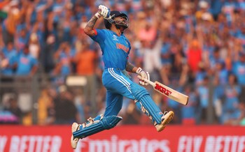 Virat Kohli of India celebrates after scoring a century, overtaking Sachin Tendulkar for the All time most ODI centuries during the ICC Men's Cricket World Cup India 2023 Semi Final match between India and New Zealand at Wankhede Stadium on November 15, 2023 in Mumbai, India