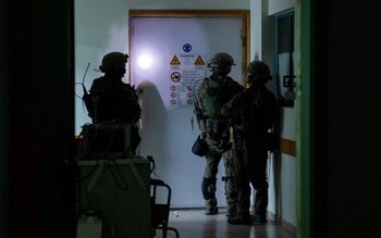 Israeli soldiers inspect the Al-Shifa hospital complex in Gaza City during their ground operation